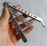 lowcost2.ru_2014.10.25-12.47.06_773900_promotion-1pc-2014-new-folding-carbon-steel-practice-training-butterfly-balisong-style-knife-comb-free-shipping
